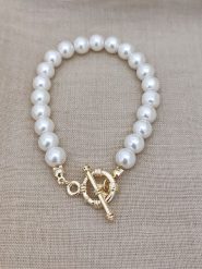 Nakkash Pozłacana bransoletka ze szklanymi koralikami rozmiar: onesize. Białe bransoletki Nakkash, pozłacane. Za 34.99 zł.