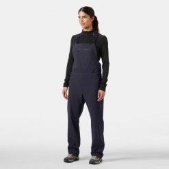 Kombinezony damskie Helly Hansen Awe. Fioletowe kombinezony Helly Hansen, na lato, bez wzorów, sportowe, bez kołnierzyka, bez ramiączek. Za 603.50 zł.