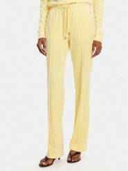 Juicy Couture Spodnie dresowe Tina JCAPW045 Żółty Regular Fit. Żółte spodnie dresowe Juicy Couture, bez wzorów, z dresówki. Za 269.99 zł.