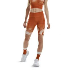 Krótkie szorty sportowe do biegania CEP limitowana kolekcja Bloom damskie. Białe szorty sportowe CEP, bez wzorów, do biegania. Za 199.00 zł.