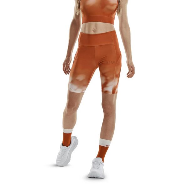 Krótkie szorty sportowe do biegania CEP limitowana kolekcja Bloom damskie. Białe szorty sportowe CEP, bez wzorów, do biegania. Za 199.00 zł.