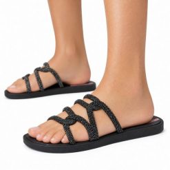 Klapki damskie Ipanema 27286 SOLAR GLOW SLIDE AD. Czarne klapki Ipanema, bez wzorów, z materiału, klasyczne, bez obcasa, bez zapięcia. Za 69.00 zł.