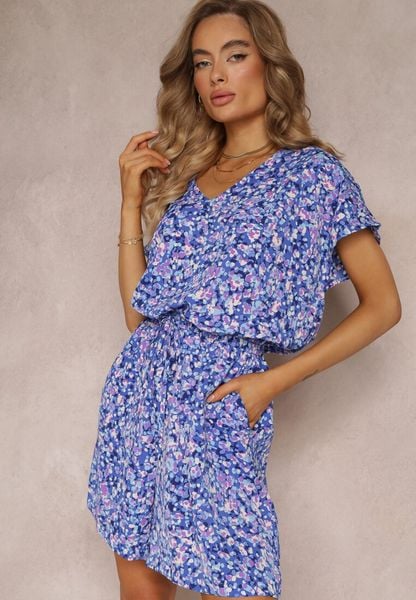 Niebieski Kwiecisty Kombinezon z Krótkimi Rękawami i Nogawkami Olyssa. Niebieskie sukienki Renee, xl, bez wzorów, z tkaniny, bez kołnierzyka, bez ramiączek, mini. Za 39.99 zł.