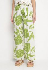 Jasnozielone Spodnie w Kwiaty o Szerokim Kroju z Gumką i Paskiem Eledina. Zielone jeansy Born2be, bez wzorów, z jeansu, eleganckie. Za 79.99 zł.