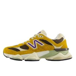 Buty do chodzenia dla dorosłych New Balance 9060 Butterscotch. Żółte buty sportowe lifestyle New Balance, bez wzorów, bez zapięcia, trekkingowe. Za 771.20 zł.