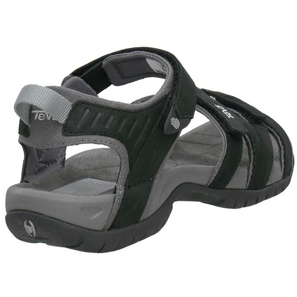 Buty do chodzenia damskie Teva Tirra. Czarne buty trekkingowe Teva, bez wzorów, z materiału, bez zapięcia, trekkingowe. Za 335.15 zł.