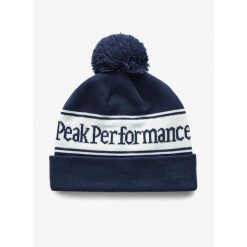 Czapka zimowa Peak Performance Pow Hat - blue shadow/offwhite. Niebieskie czapki zimowe Peak Performance, bez wzorów, sportowe. Za 161.99 zł.