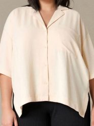 Koszula z kieszonką - kremowy. Białe koszule Sinsay, l, bez wzorów, eleganckie, bez kołnierzyka, plus size, bez ramiączek. Za 69.99 zł.