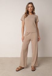 Beżowe Szerokie Spodnie z Prążkowanej Tkaniny z Wysokim Stanem Sarora. Brązowe spodnie materiałowe Born2be, bez wzorów, z jeansu, z podwyższonym stanem. Za 59.99 zł.