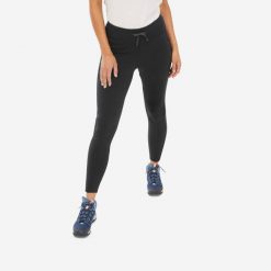 Legginsy turystyczne damskie Quechua NH100. Czarne legginsy QUECHUA, bez wzorów, z elastanu, sportowe. Za 99.99 zł.