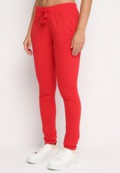 Czerwone Spodnie Dresowe z Gumką w pasie i Troczkiem Halemia. Czerwone jeansy Born2be, l, bez wzorów, z dresówki, eleganckie, długie. W wyprzedaży za 38.24 zł.