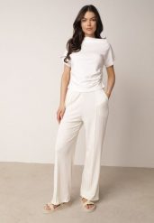 Jasnobeżowe Szerokie Spodnie z Prążkowanej Tkaniny z Wysokim Stanem Sarora. Brązowe jeansy Born2be, m, bez wzorów, z jeansu, z podwyższonym stanem. Za 59.99 zł.