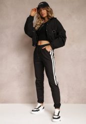 Czarne Dresowe Spodnie z Gumką w Talii i Lampasami Nikole. Czarne spodnie sportowe Renee, bez wzorów, z dresówki, długie. W wyprzedaży za 31.99 zł.