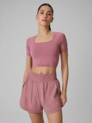 4F Crop top treningowy bezszwowy damski - różowy XS/S. Czerwone topy 4f, s, bez wzorów, z materiału, sportowe, bez kołnierzyka, bez ramiączek. Za 79.99 zł.