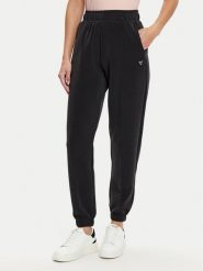 Guess Spodnie dresowe V5RB11 KCAY2 Czarny Regular Fit. Czarne spodnie dresowe Guess, z aplikacjami, z dresówki. Za 269.99 zł.