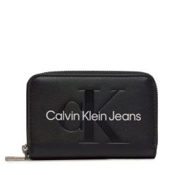 Mały Portfel Damski Calvin Klein Jeans. Czarne portfele Calvin Klein Jeans, bez wzorów, z jeansu. Za 169.99 zł.