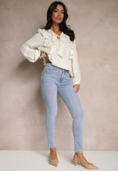 Jasnoniebieskie Jeansy z Bawełny Typu Slim Felindrae. Niebieskie jeansy Renee, bez wzorów, z bawełny, eleganckie. W wyprzedaży za 59.99 zł.