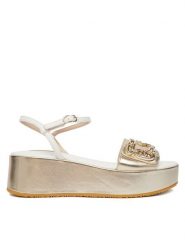 Liu Jo Sandały Flo 01 SA6137 PX026 Złoty. Żółte sandały Liu Jo, bez wzorów, ze skóry, bez obcasa, na koturnie, bez zapięcia. Za 599.99 zł.