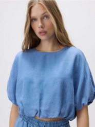 Jeansowa bluzka z lyocellu - niebieski. Niebieskie bluzki Reserved, l, bez wzorów, z jeansu, bez kołnierzyka, bez ramiączek. Za 129.99 zł.