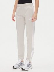 Adidas Spodnie dresowe Tricot 3-Stripes JD4536 Beżowy Regular Fit. Brązowe spodnie dresowe adidas, bez wzorów, z dresówki. Za 199.99 zł.