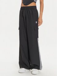 Adidas Spodnie dresowe adicolor 3-Stripes JF1292 Czarny Loose Fit. Czarne spodnie dresowe adidas, bez wzorów, z dresówki. Za 249.99 zł.