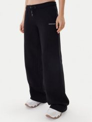 Guess Jeans Spodnie dresowe W6RB52 K68I4 Czarny Regular Fit. Czarne spodnie dresowe Guess Jeans, z aplikacjami, z bawełny. Za 299.99 zł.