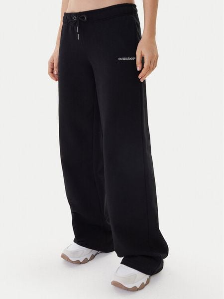 Guess Jeans Spodnie dresowe W6RB52 K68I4 Czarny Regular Fit. Czarne spodnie dresowe Guess Jeans, z aplikacjami, z bawełny. Za 299.99 zł.