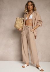 Ciemnobeżowy Wiskozowy Komplet Oversize Zdobiony Haftem Koszula i Spodnie Sadrianae. Brązowe koszule Renee, l, z aplikacjami, z materiału, eleganckie, bez kołnierzyka, bez ramiączek. W wyprzedaży za 119.99 zł.