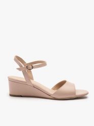 Beżowe sandały na koturnie. Brązowe sandały Ryłko, bez wzorów, ze skóry, eleganckie, bez obcasa, na koturnie, bez zapięcia. Za 379.99 zł.