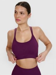 4F Biustonosz do jogi i pilatesu z niskim wsparciem - fioletowy M/L. Fioletowe biustonosze sportowe 4f, bez wzorów, z dzianiny, na fitness i siłownię. W wyprzedaży za 99.99 zł.