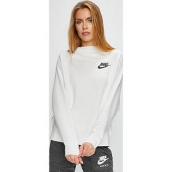 Nike Sportswear - Bluza. Białe bluzy Nike Sportswear, l, bez wzorów, z bawełny, bez kaptura. W wyprzedaży za 199.90 zł.
