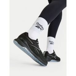 Buty na siłownię Reebok. Czarne buty treningowe Reebok, bez wzorów, bez zapięcia, na fitness i siłownię. Za 599.99 zł.