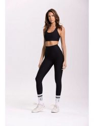 Onamaste Legginsy sportowe "Lotus" w kolorze czarnym rozmiar: S/M. Czarne legginsy Onamaste, bez wzorów, z materiału, sportowe. Za 118.56 zł.