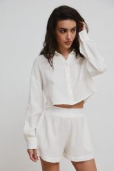 Krótka koszula z muślinu w kolorze ECRU - PORTELA-XS/S. Koszule Marsala, s, bez wzorów, z bawełny, eleganckie, bez kołnierzyka, bez ramiączek. Za 169.90 zł.