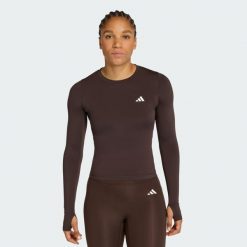 Bluzka z długim rękawem PrimeLift Essentials Workout Contour. Brązowe bluzki adidas, bez wzorów, sportowe, bez kołnierzyka, bez ramiączek. Za 149.00 zł.