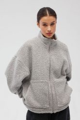Wełniana bluza damska zapinana na zamek w kolorze SZARYM- VELMORE -UNI. Szare bluzy Marsala, na zimę, m, bez wzorów, z bawełny, bez ramiączek, bez kaptura. Za 599.90 zł.