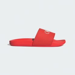 Klapki Adilette Comfort Audi Revolut F1 Team. Białe klapki adidas, bez wzorów, sportowe, bez obcasa, bez zapięcia. Za 239.00 zł.