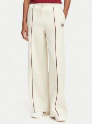 Reebok Spodnie dresowe Oliwia RK25683CCW Beżowy Regular Fit. Brązowe spodnie dresowe Reebok, bez wzorów, z bawełny. Za 199.99 zł.
