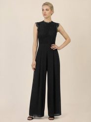 APART Kombinezon w kolorze czarnym rozmiar: 34. Czarne kombinezony Apart, bez wzorów, z koronki, bez kołnierzyka, bez ramiączek. Za 499.95 zł.