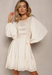Jasnobeżowa Sukienka Boho Ozdobiona Ażurowymi Wstawkami i Koronką ze Sznurkiem w Talii Lanekade. Brązowe sukienki Renee, na spotkanie biznesowe, l, w ażurowe wzory, z koronki, boho, bez kołnierzyka, bez ramiączek, mini. W wyprzedaży za 127.99 zł.