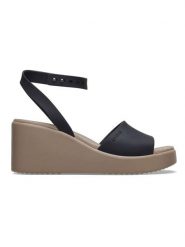 Crocs Sandały "Brooklyn" w kolorze czarnym na koturnie rozmiar: 39/40. Czarne sandały Crocs, bez wzorów, z otwartym noskiem, bez obcasa, na koturnie, bez zapięcia. Za 118.01 zł.