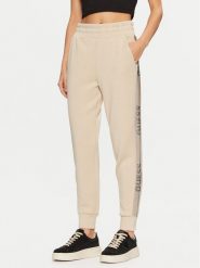 Guess Spodnie dresowe W5RB00 KBYE2 Écru Regular Fit. Spodnie dresowe Guess, z aplikacjami, z dresówki. Za 289.99 zł.