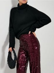 Golf z ozdobnymi rękawami - czarny. Czarne swetry Sinsay, l, bez wzorów, bez ramiączek. Za 59.99 zł.