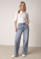 Niebieskie Jeansy z Bawełną Szerokie z Wysokim Stanem Artilla. Niebieskie jeansy Born2be, bez wzorów, z bawełny, eleganckie, z podwyższonym stanem. Za 119.99 zł.