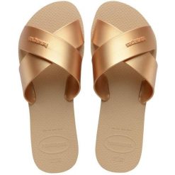 Klapki Havaianas Model 4148866h Kolor Brąz. Brązowe klapki Havaianas, bez wzorów, z gumy, sportowe, bez obcasa, bez zapięcia. Za 83.99 zł.