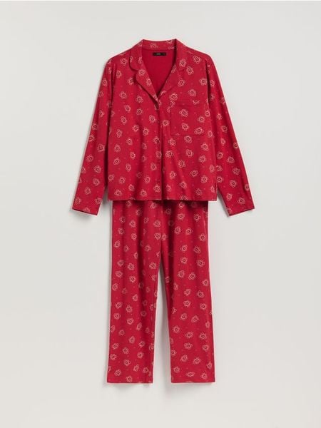 Dwuczęściowa piżama ze świątecznym nadrukiem - czerwony. Czerwone piżamy Reserved, l, bez wzorów, z bawełny, bez kołnierzyka, bez ramiączek. Za 129.99 zł.