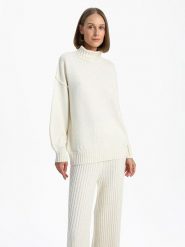 BGN Sweter w kolorze kremowym rozmiar: 40. Brązowe swetry BGN, bez wzorów, ze splotem, bez ramiączek. Za 127.65 zł.
