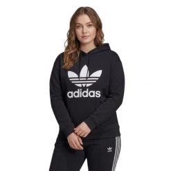 Bluza sportowa damska Adidas Trefoil Hoodie oversize. Czarne bluzy z kapturem adidas, plus size, bez wzorów, z bawełny, z kapturem, na fitness i siłownię. Za 192.00 zł.