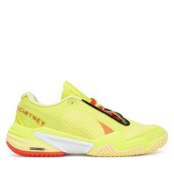Buty na siłownię adidas. Żółte buty treningowe adidas, bez wzorów, bez zapięcia, na fitness i siłownię. Za 679.99 zł.