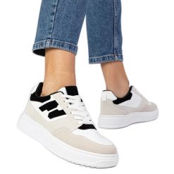 Biało-czarne sneakersy trampki damskie białe. Białe trampki bez wzorów, z syntetyku, eleganckie, bez zapięcia. Za 84.03 zł.